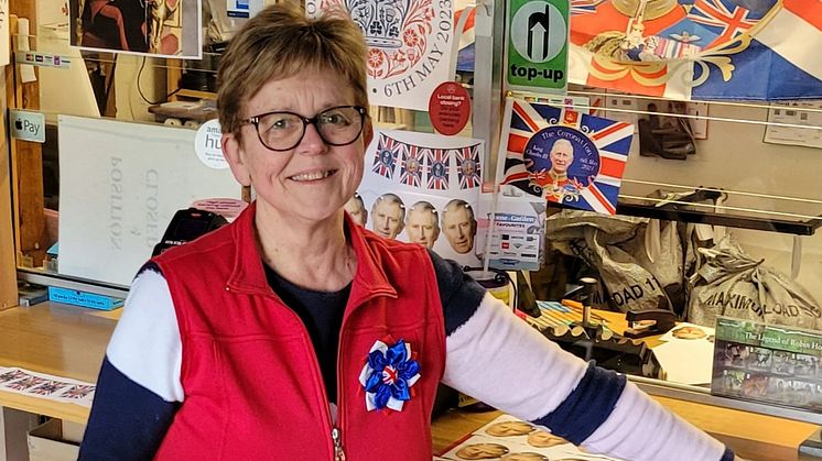 Trewoon Postmistress Sally Bourton in Coronation decorated Post Office