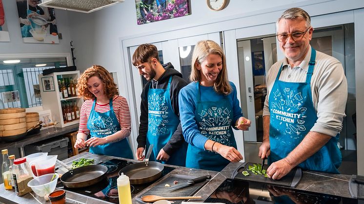 People take part in a Brighton Community Kitchen session