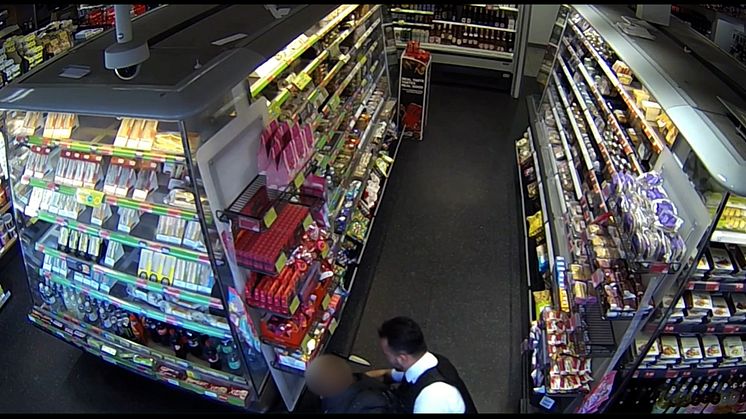 PC Younger tackles suspect.jpg