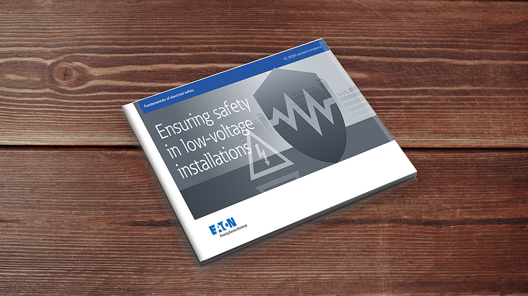eaton-guide-fundamentals-of-electrical-safety-buildings-guide-on-table-en-us.png