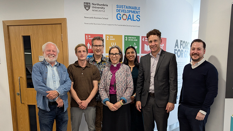 Group photo of experts who convened for a roundtable discussion on the social economy.