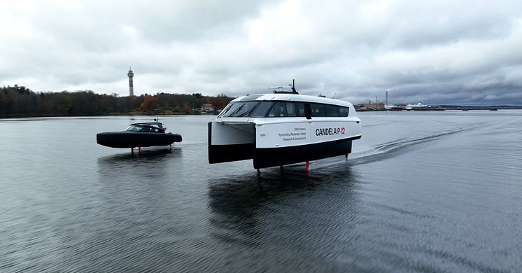Candela's revolutionary electric C-8 leisure boat and P-12 ferry flying side by side, in Stockholm.