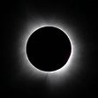 A picture of a solar eclipse taking place.  