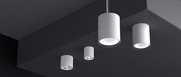 Bild: LTS Licht & Leuchten GmbH. Die Button Familie v. li: Button Mini 200, Button Mini 100, Button Evo Pendelleuchte, Button Evo Anbauvariante.