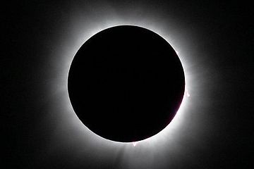 A picture of a solar eclipse taking place.  