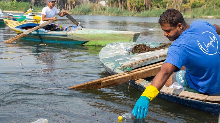 Collecting plastic waste from the Nile, one throwaway bottle at a time. (Credit: Empower)