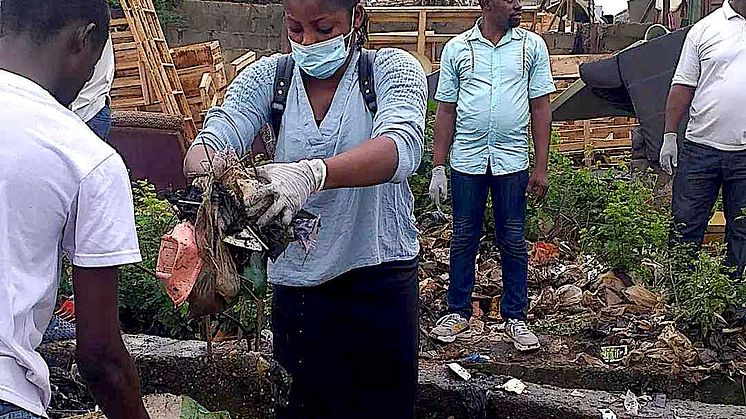 Bluewater helps a plastic waste clean up in Nigeria as part of the company's pledge to remove one kilo of plastic waste for every sustainable bottle it sells (Credit: Empower)