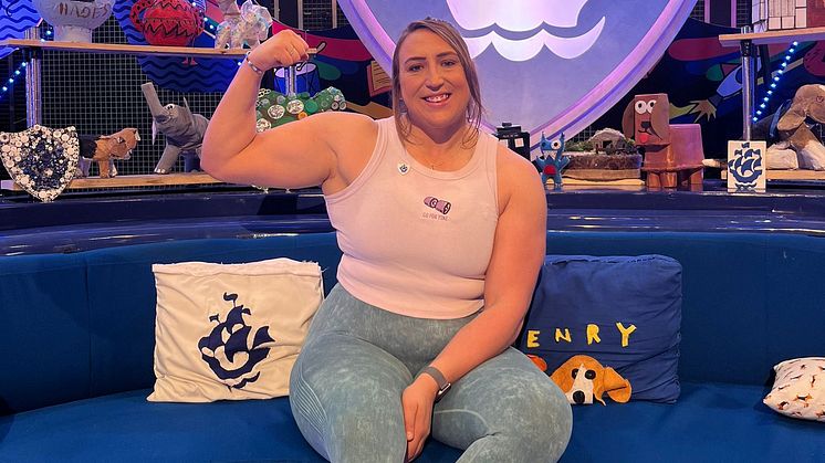 [PC Lucy Underdown on the Blue Peter sofa...with badge]