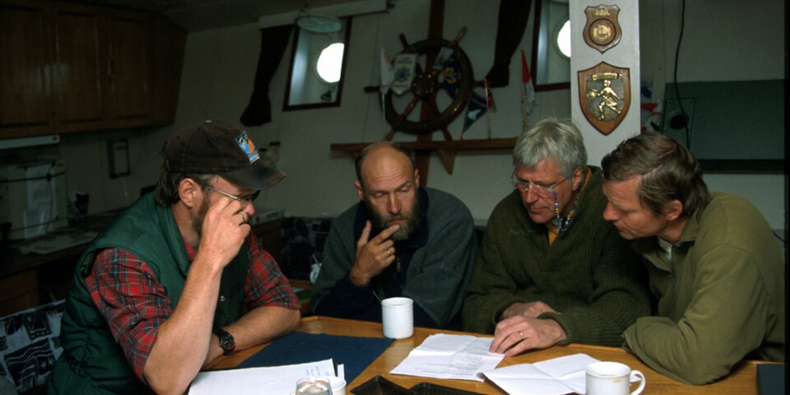 Frequent collaborators, left to right: Haakon Hop, Jan-Marcin Węsławski head of cruise, now director of IOPAN, Stig Falk-Petersen, and Salve Dahle onboard RV Oceania in 1996. Photo: Mikael Westh Hammer