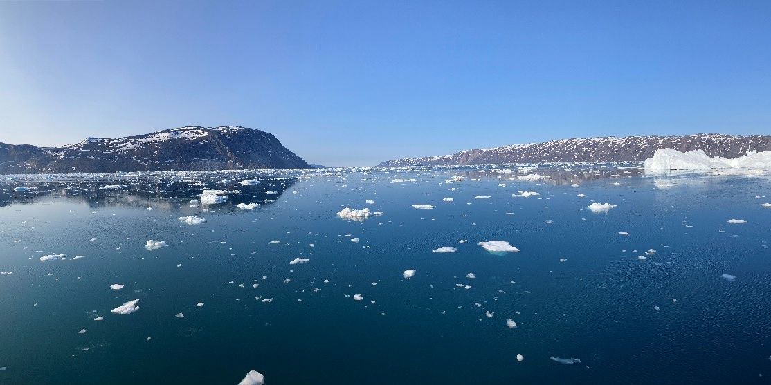 Sampling on a clear and sunny day in Eqi fjord near Disko Island, West Greenland (Photo: Amanda Ziegler)