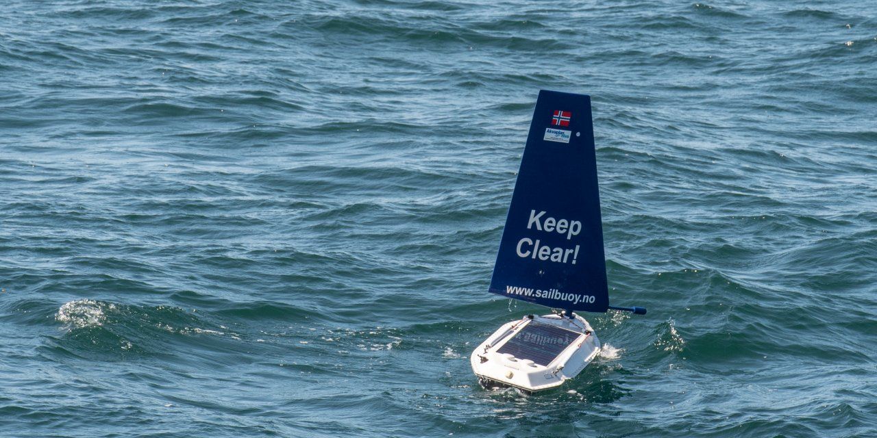 The autonomous sailbuoy powered by the wind and sun collecting data at Hywind Scotland.