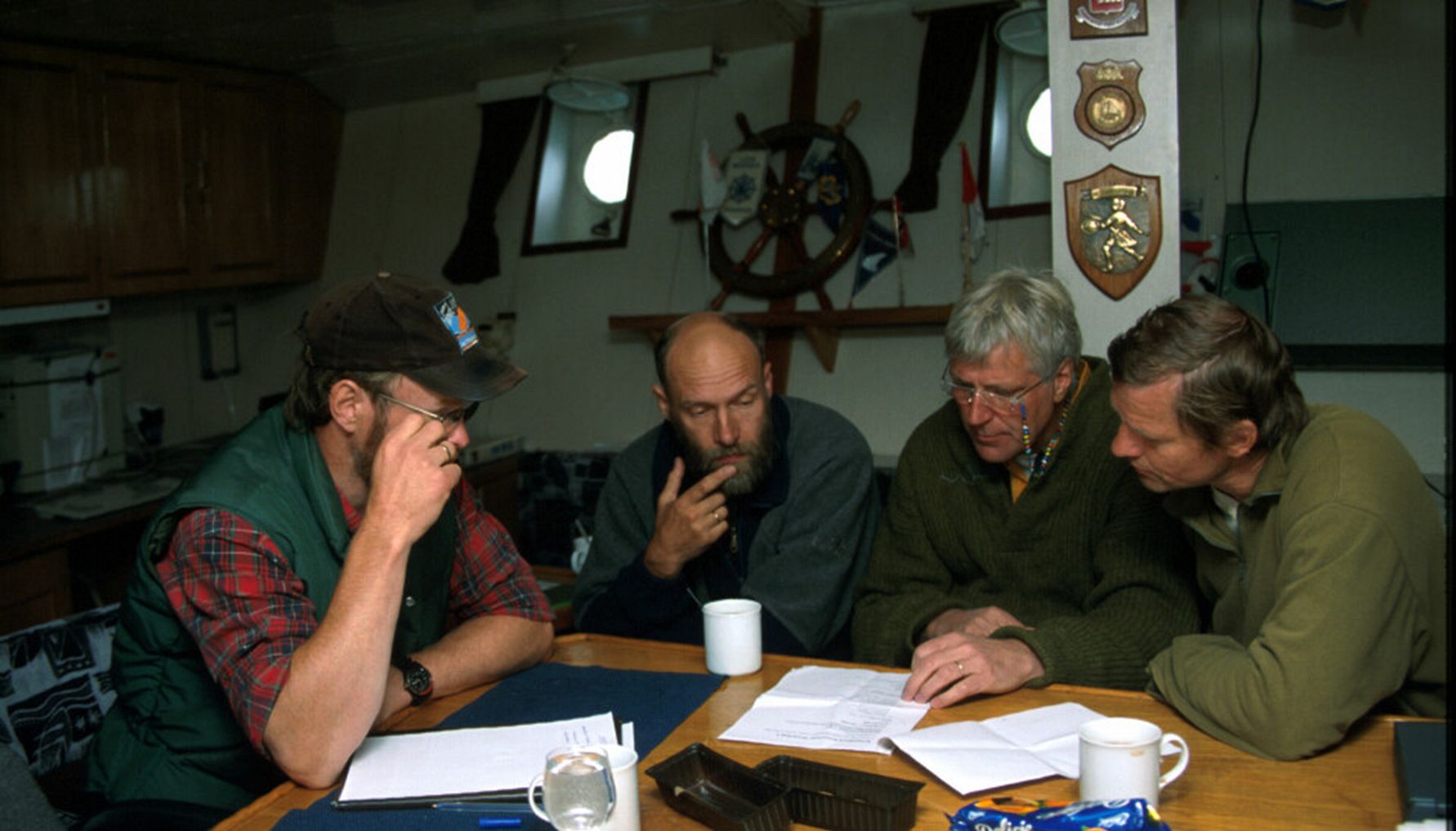 Haakon Hop, Jan-Marc Marcin Węsławski head of cruise, Stig Falk-Petersen and Salve Dahle onboard Oceania in 1996.jpg
