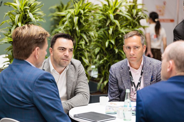 CEO Kaloyan Velichkov (2nd left) at Intersolar 2025