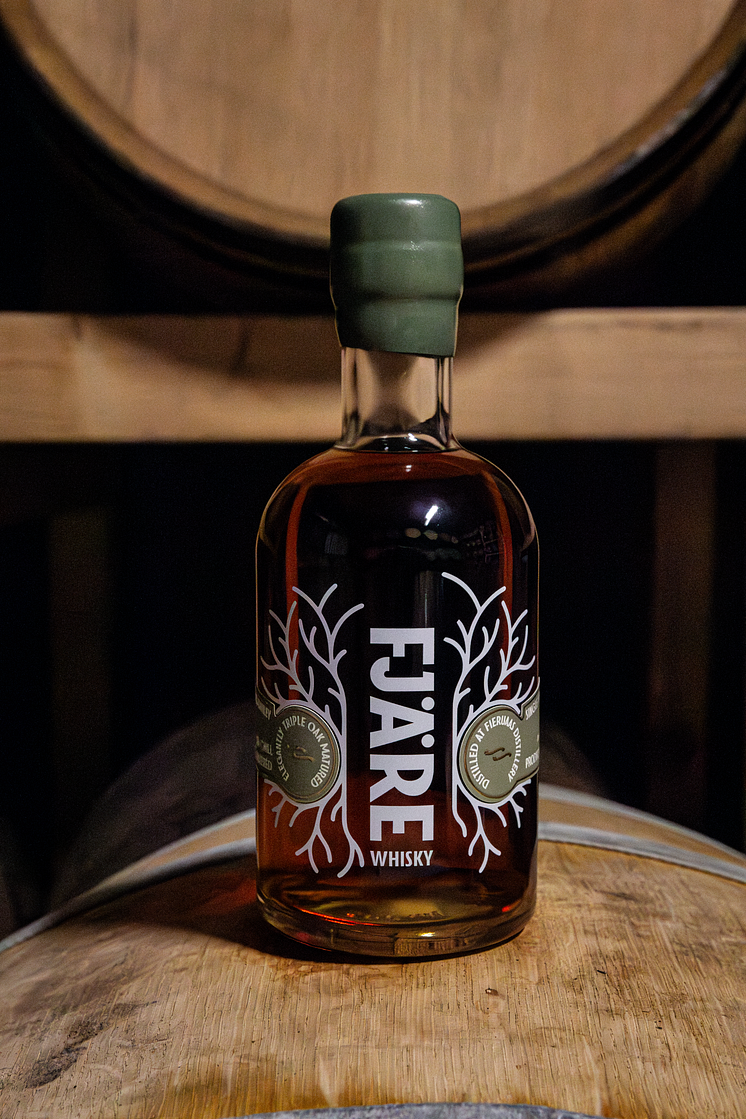 Bottle on cask.png