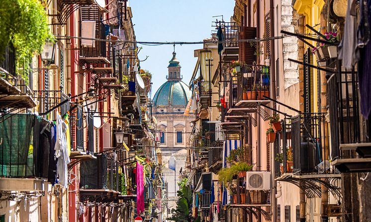 narrow-street-palermo-sicily-italy-getty-images-1178373302.png