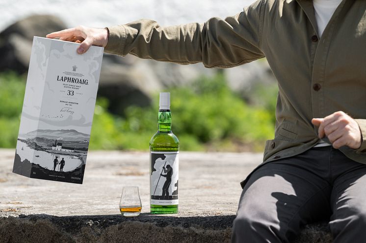 Laphroaig33YearOldStrongCharacter_Bottle&BoxInHand.jpg