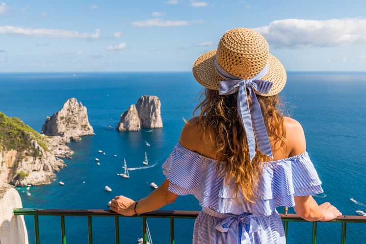 italy-naples-capri-sea-woman-918440300