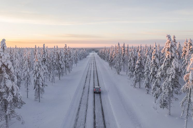 A+road+in+winter+with+a+car+with+Nokian+Tyres+winter+tires.jpg