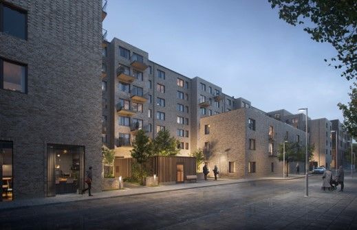Pilevall fasad med gårdshus.jpg