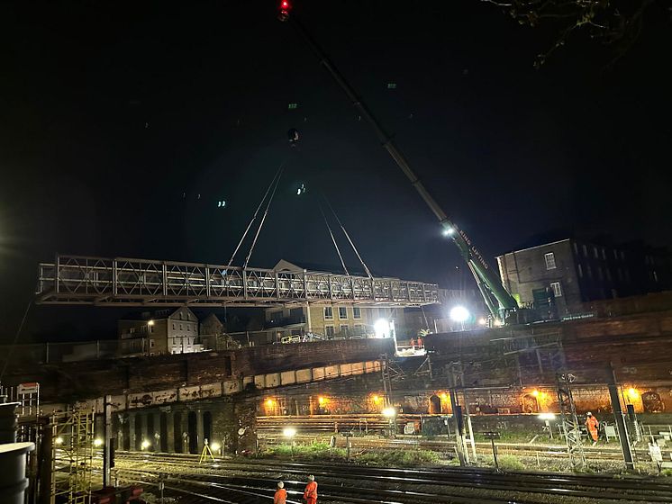 Engineers putting in a temporary footbridge at Agar Grove in Camden, Network Rail.jpg