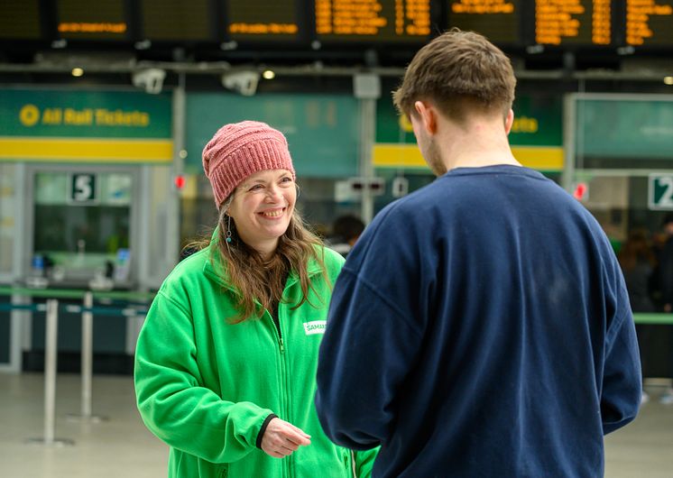 A Samaritans volunteer talks to a member of the public about the campaign. Image was taken in 2023