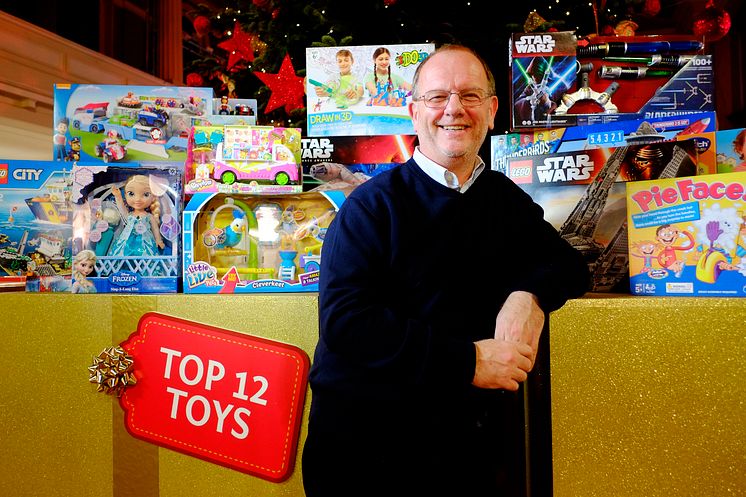 DreamToys chairman, Gary Grant, stands in front of 2016's DreamToys Top Twelve toys  