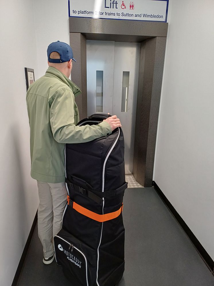 Passenger using new lift at Tooting.jpg