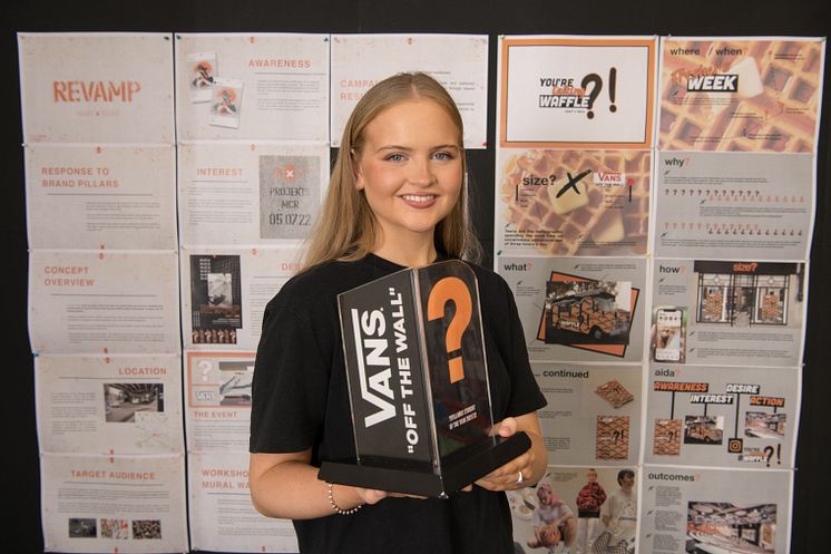 Graduate Olivia Mackinnon with her Student of the Year award