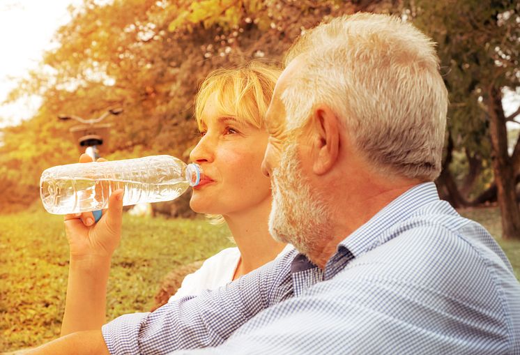 OlderCoupleDrinking_CREDITthebigland88 _iStock-1172768234