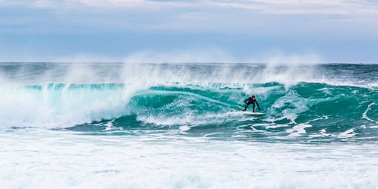 Surfing  Unstad  Lofoten- Photo - Alex  Conu - VisitNorway.com.jpg