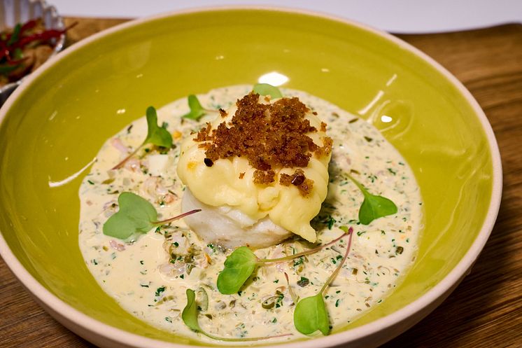 10 Skrei fish pie topped with creamed mustard mash, a herb crumb, and a prawn tartare sauce.jpg