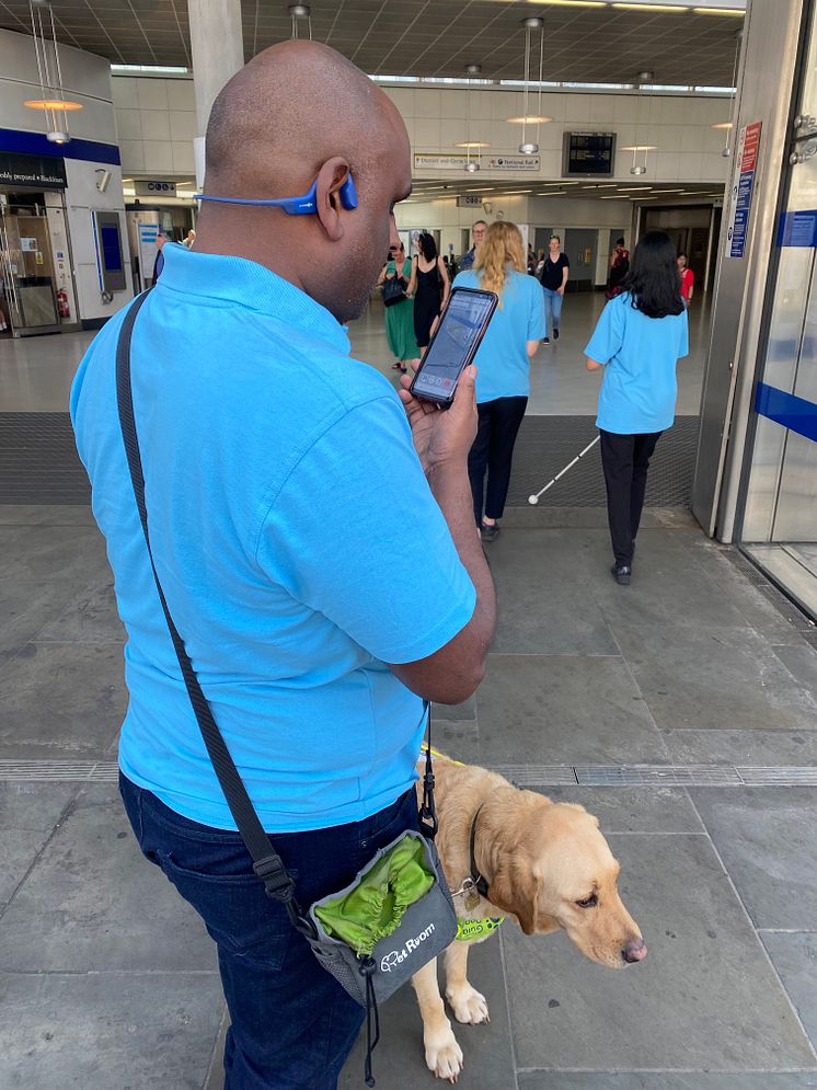 Sight Loss Council volunteer Haren trials the Aira app at Blackfriars station 