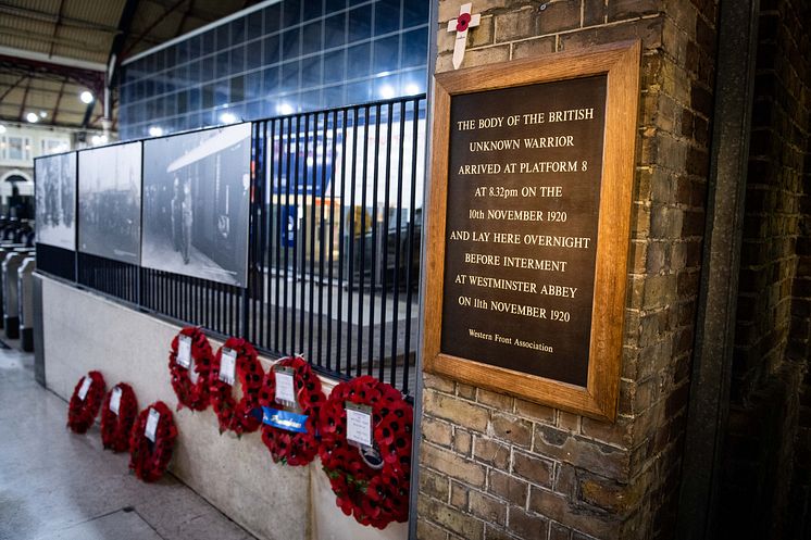 Commemorative poppy wreaths adorn platform 8 at Victoria station