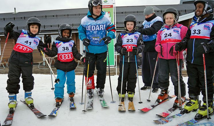 Alla på snö Hammarbybacken med ledare