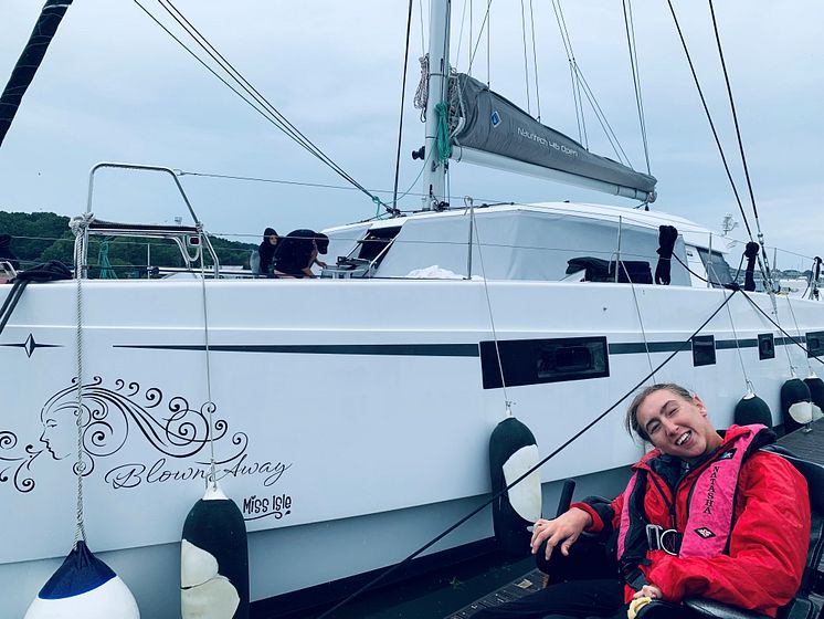 Hi-res image - Fischer Panda UK - Sailor and adventurer Natasha Lambert with her boat 'Blown Away'