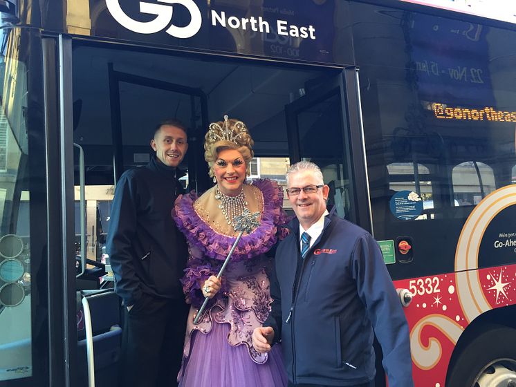 Go North East drivers Paul (r) and Alan with the Fairy Godmother with GNE drivers