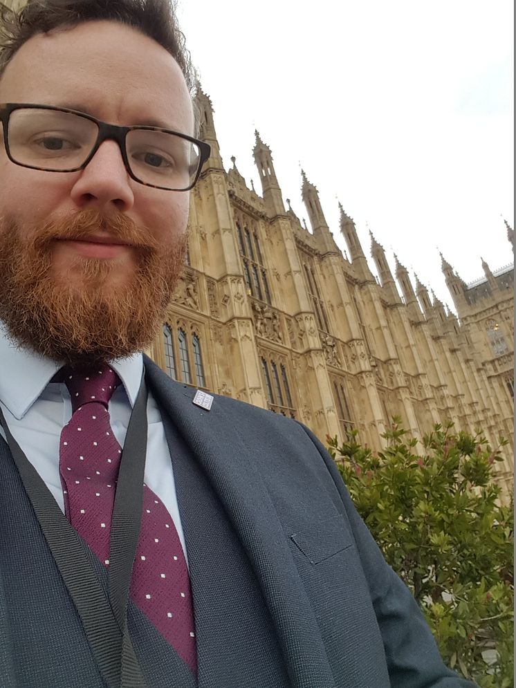 Euan Macfarlane outside The Houses of Parliament