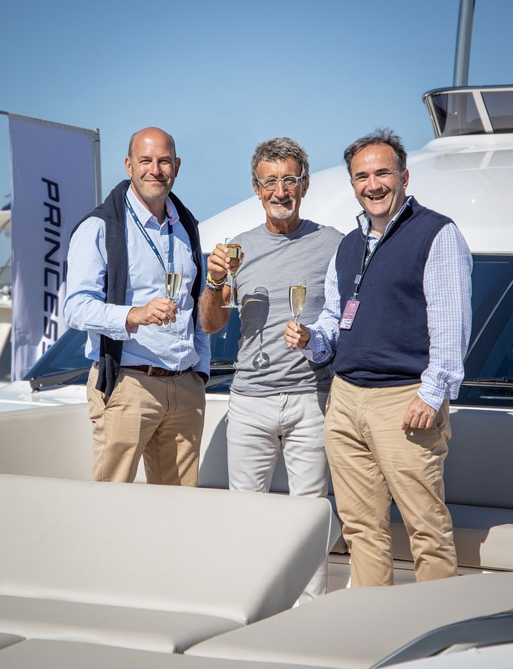 High res image - PMYS - Eddie Jordan with Princess Yachts CEO Antony Sheriff and Chief Operations Officer Paul Mackenzie at the Southampton Boat Show 2019. 