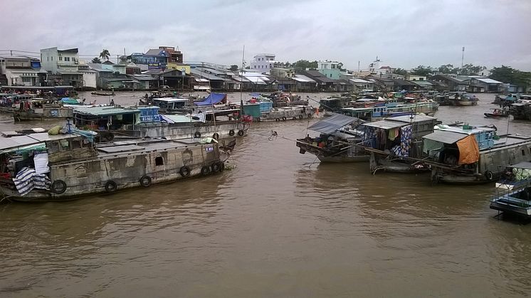 Floating market on the Mekong River in Vietnam