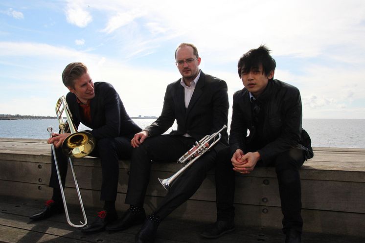 Trio Huang-Draglund-Rudolfsson