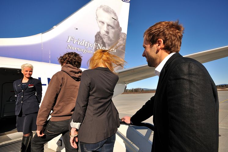 Passengers entering a Norwegian flight