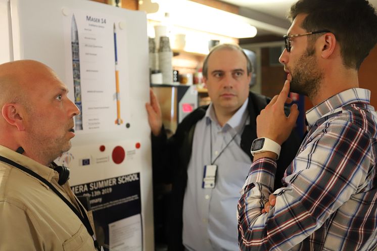 Left to right: Carlo Iorio (ULB), Andrea Ferrari (Cambridge) and Daniele Mangini (ESA) discuss the experiment. Credit: Graphene Flagship.