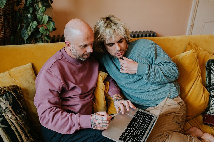 THEME_LGBTQ_GAY_COUPLE_LAPTOP_UK_GettyImages-1391657397_Universal_Within usage period_97929