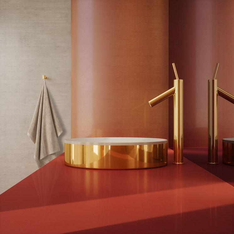 AXOR Suite round washbasin with AXOR Starck in gold
