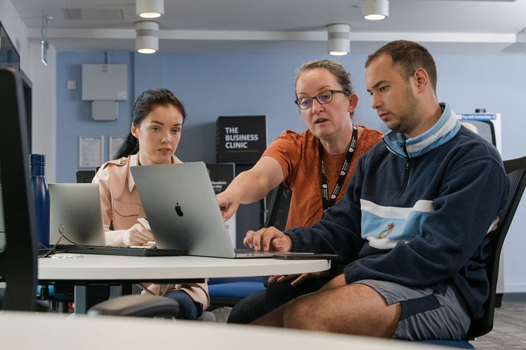 Students collaborating in the Business Clinic