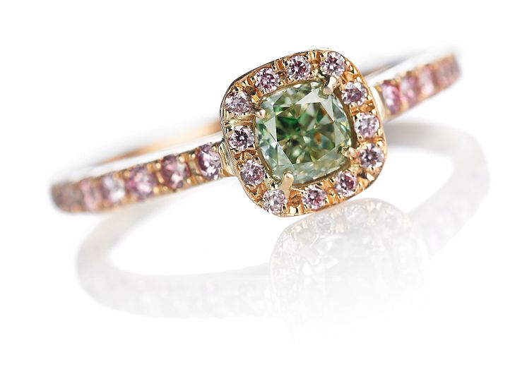 Green and pink diamond ring set with a natural fancy intense green diamond and  natural pink Argyle diamonds.