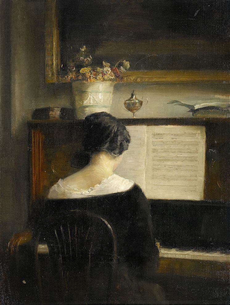 3195. Carl Vilhelm Holsoe, Interiör med dam vid piano Utrop: 180 000-200 000 SEK