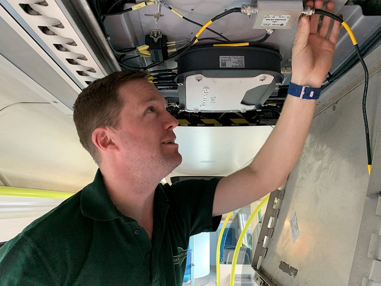 GTR Wireless engineer Robin Hayman fitting wi-fi 3