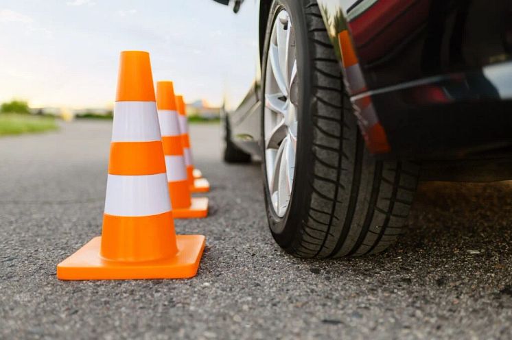 car-and-traffic-cones-driving-school-concept-1024x681