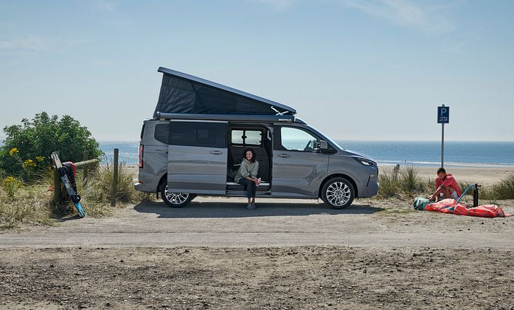 2024FordTransitNuggetLWBTitanium_4_side_Talents.jpg